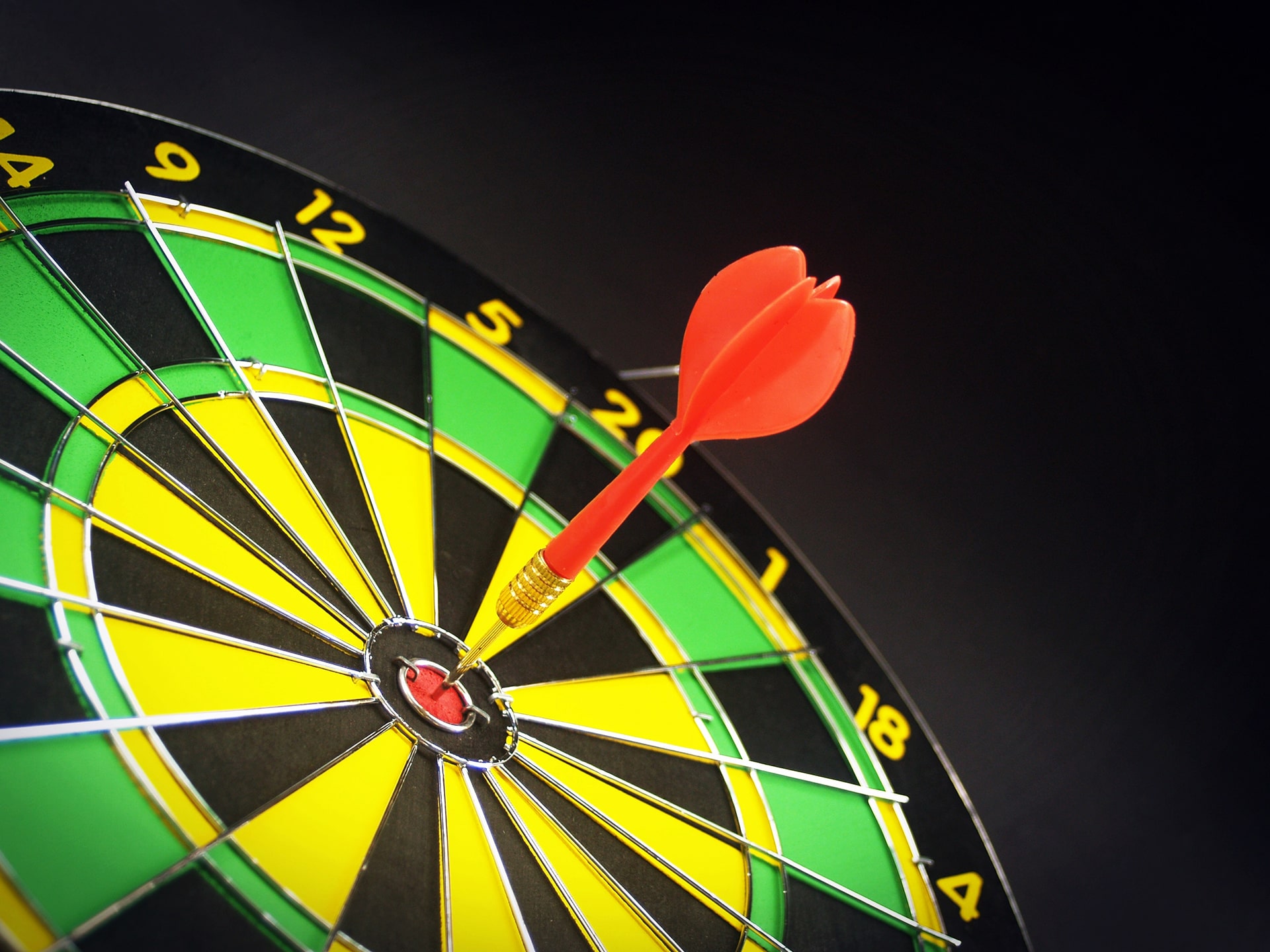 Two sets of darts in a board. Photo by Marc A on Unsplash - https://unsplash.com/@grvault?utm_source=unsplash&utm_medium=referral&utm_content=creditCopyText